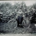 Annie Newbury of Mystic with her bicycle, 1890s