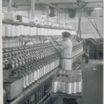 Mill interior: women at roving frame, 1920