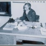 Police officer at desk, Madison, 1946