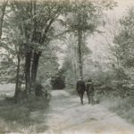 Students walking on Gurleyville road, Storrs, 1930s